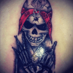 First tattoo at 15years old #skeletontattoo #westside #middlefinger #bullethole #bandana #2pac #hintofred 