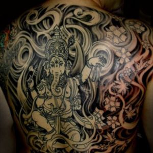 Tattoo by Lark Tattoo artist/owner Bruce Kaplan. #fullback #backpiece #backtattoo #ganesh #flowers #flames #smoke #negativespace #bng #bnginksociety #blackandgrey #blackandgray #blackink Tattoo by Lark Tattoo artist/owner Bruce Kaplan. #brucekaplan #owner #artist #ownerartist #artistowner #LarkTattoo #LarkTattooWestbury #NY #BestOfLongIsland #VotedBestOfLongIsland #BestOfNYC #VotedBestOfNYC #VotedNumber1 #LongIsland #LongIslandNY #NewYork #NYC #TattoosEvenMomWouldLove  #NassauCounty #tattoo #tattoos #tat #tats #tatts #tatted #tattedup #tattoist #tattooed #tattoooftheday #inked #inkedup #ink #tattoooftheday #amazingink #bodyart