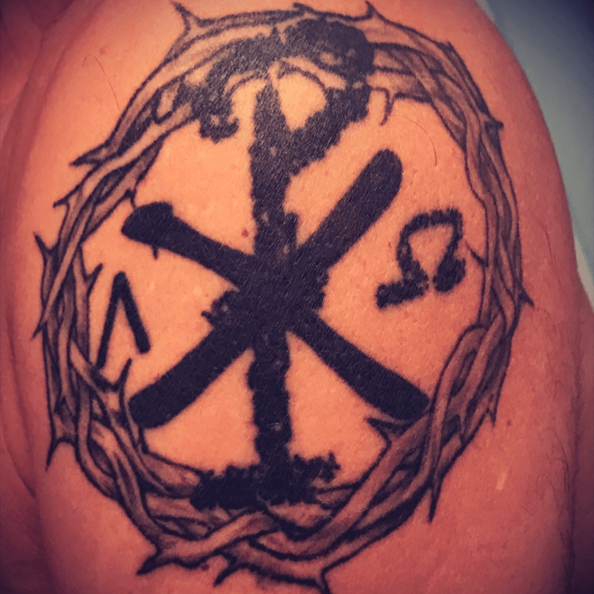 Disciple  disciplejoeys brand new tattoo representing Disciple and the Chi  Rho logo Each band member has their own version of the logo tattooed on  their arm Just one more member left