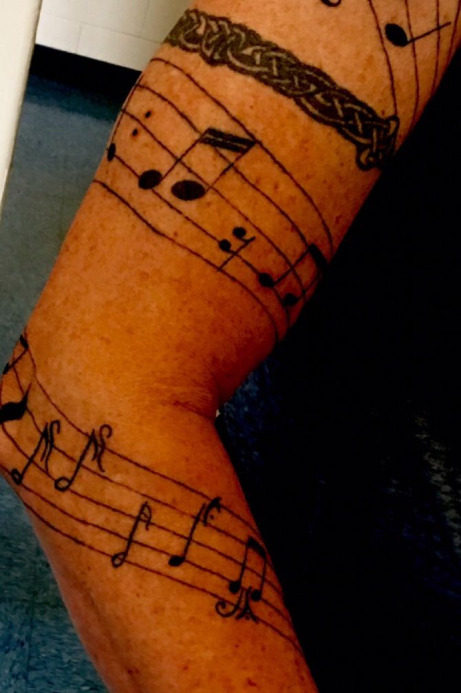 Music Note Tattoos Around Arm