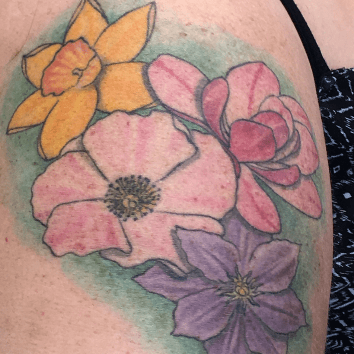 Start of my floral sleeveClematis tattoo
