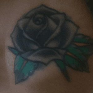 Rose tattoo originally done by Scott Marshall at vanity tattoo. Rose leafs and touch up done by Noodles at Noodles tattoo