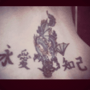 Original dragon designed for me by artist : Pierced Buddha Aztec NM  Mandarin Chinese: Soul Mate on left, on right: forever love. I need a better picture!