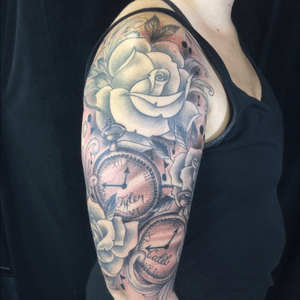 Upper right half sleeve with roses and pocket watches to represent the clients two children. Done by Chris MacCharles