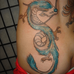 A dragon on my lower back and my fourth tattoo