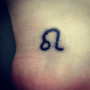 My third tattoo i'm a leo and always wanted my zodiac sign tattooed.. 