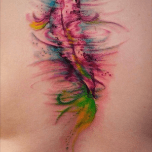 The result of a 4hr session with #versusink, I named this little dude Alberto. Even if he fades I look forward to playing with the colours and adding details. Done by Versus ink, Asgard Southampton, UK.#moretocome #watercolour #fish #koicarp #multicoloured #back #upper #lotus #healed #ripple #effect #southampton #tattoo #ink #colour #savemyink #inkaddict 