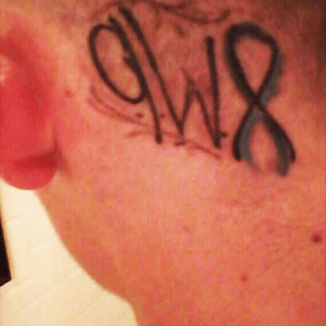 Youngest childs ribbon and initials for his hydrocephalous curtousy of Voodoo tattoo in OHIO 