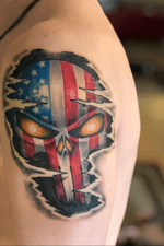 Punisher Americana, I couldn’t decide between two or three tattoos, so Mitch at The Living Art Studio in Duluth, MN combined them to make this gem. Still in awe when i see this.