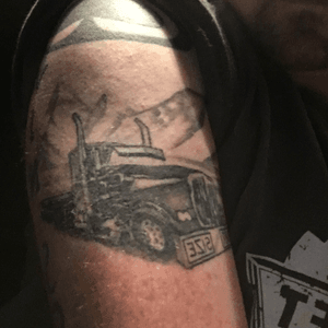 Start of my heavy haul semi half sleeve on my left arm ots about 50% complete now. Trucking has been apart of my life for almost 5 years so i decided to put it on my arm where i can be proud of what i do