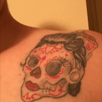 Rockabilly style, with sugar skull for my Mexican heritage.