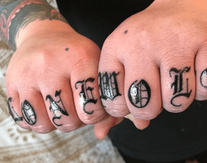 My knuckle tats my best friend and amazing artist gave me. @rudiredmantattoo on instagram or facebook #rudiredman #rudiredmantattoo #lonewolf #knuckletattoos 