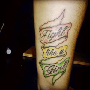 Fight like a girl. Pretty much says it all. Again i gave my guy and idea and gave him the go agead and this is the result. Very spesific with the colors and everything. Pink for breast cancer. Yellow for spinabifida. And green for kidney failure. 3 very important females in my life dealing with these things inspired this tattoo. #pink #green #yellow #fightlikeagirl 