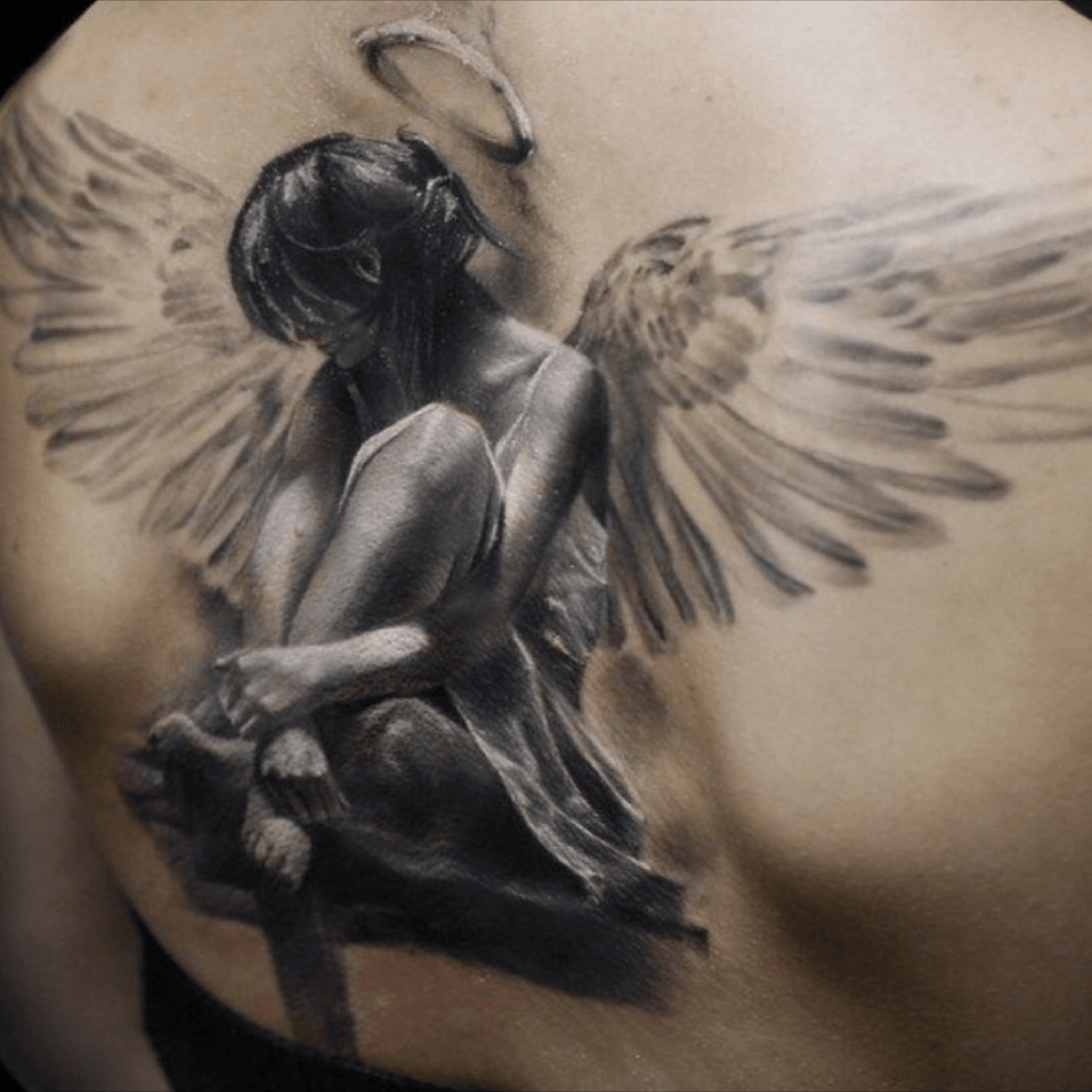 real angel wings tattoo