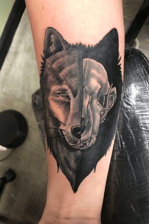 Inspiration for tattoo was that I love a good vs. evil comparison plus wolves are my favorite animal.