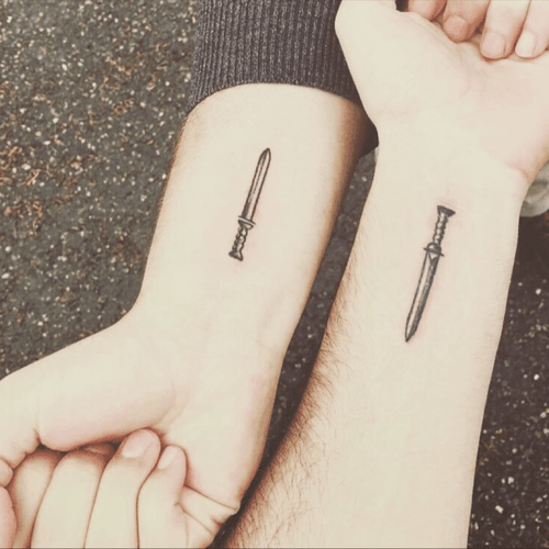 Never give up, life is a war against your self #tattoo #wrist #fight #warrior #sword #friends #matchingtattoo 