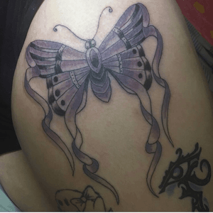 Got this tattoo about a year ago. #Butterly #Alzheimers #PurpleRibbons #Tattoos #ThighTattoos #BigTattoos #Black #Purple 