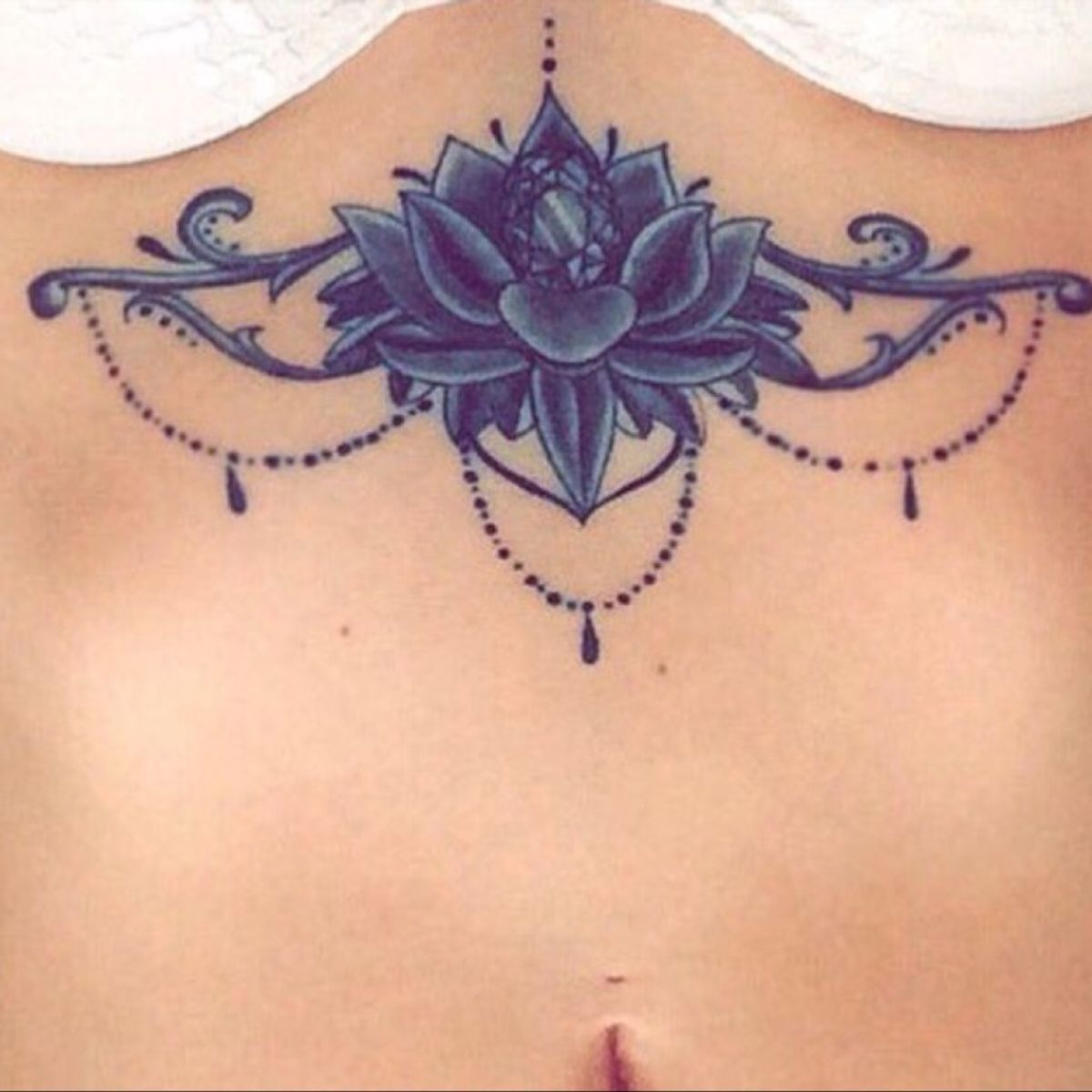 Tattoo uploaded by Sav • Fresh ink, lotus underboob design • Tattoodo