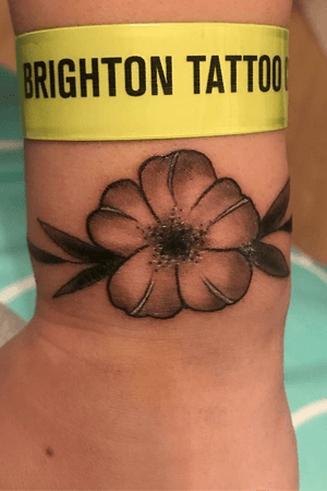 Flower Tattoo on wrist done at the Brighton Tattoo Convention. Done by Ellis Arch from Nemisis Tattoo. #tattoo #armtattoo #wristtattoo #flower #floral #blackandgrey #flowertattoo #floraltattoo #brightontattooconvention 