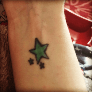 Tattoo uploaded by yasabell • First ever tattoo stars on my wrist #tattoo # tattoos #tat #ink #inked #tattooed #tattoist #coverup #art #design  #instaart #instagood #sleevetattoo #handtattoo #chesttattoo #photooftheday  #tatted #instatattoo #bodyart #tatts #