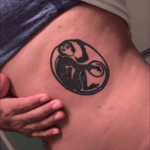 My second tattoo! Its a monkey, obiously. I got this for many reasons like: "Monkey" was my nickname growing up, monkeys are my favorite animals, and I like to think that i can make myself look like a monkey! 
