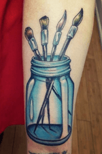 Paintbrushes in mason jar