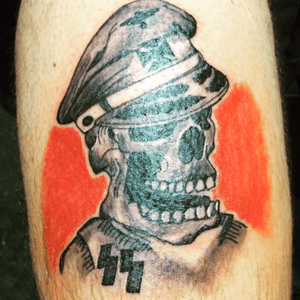 Just a little nazi skull, start or a war themed thigh 