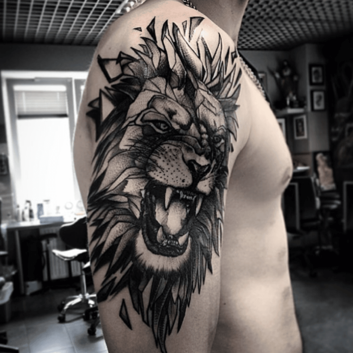 lion roar black and white tattoo