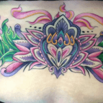 #mandala #lowerback #gorgeous #tattoo #fullofcolor #myfave #tattooedwomen #sevenhours #worthit 