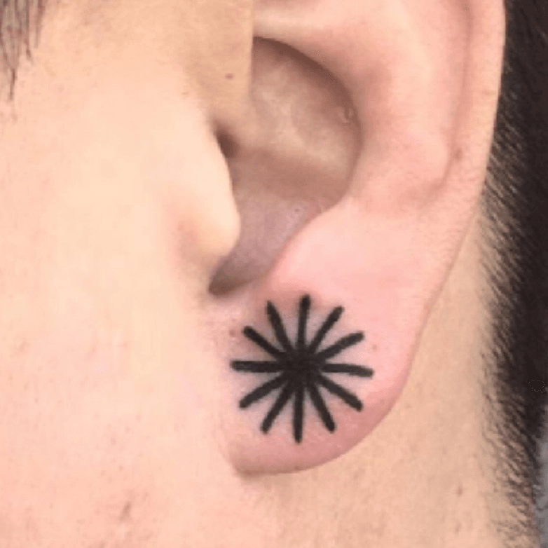 Tattoo uploaded by Bindy  earlobe tattoo of black outline of star by  artist Kimsany Kimsany ear  Tattoodo
