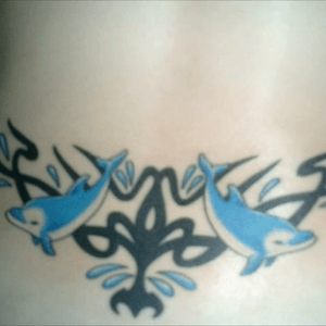 Second tattoo. I love dolphins lol
