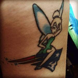First tattoo I ever got! Tinkerbell flying on the logo of the New England Patriots - two of my loves. 