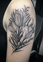 Flowers by tattoo artist Silvia Akuma.