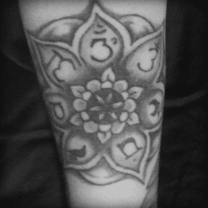 Lotus flower mandala with the 7 chakra symbols in sanskrit. Designed by myself. Tattoed by Todd Durham, Indiana. 