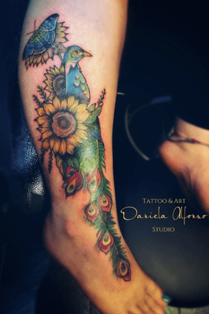 Peacock and sunflower! #peacok #sunflower #butterfly #solartattoo #tattoo #tattooartist