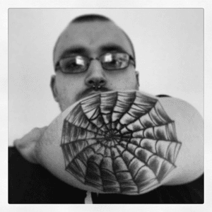 My first tattoo. Got it at Old Town Tattoos in Edinburgh. #spiderweb #punk #skinhead #elbow #spiral #blackandgrey 