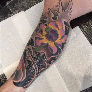 Outside section done on Andy's leg. Lotus and temple. 