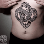 #snake on #sternum #coenmitchell @coenmitchell #black #patterns #flowers #dotwork 