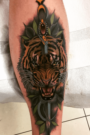 Tattoo done by @Dariushsmith in colourworks tattoo studio dublin. #neotraditional #tiger #dagger #shintattoo 