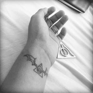 Magic day when I got my first tattoo representing my amazing time in #newcastle #uk #harrypotter #mydesign #deathlyhallows #dragonwings #studentlife #memories #happiness 