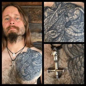 A woodcarving tattoo I did on Grutle, vocalist of Enslaved :) The tattoo shows Tor catching Loke (as a salmon) in a fishing net. ( The Enslaved Bearhammer is also my design)