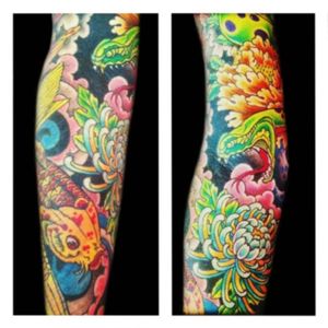 Tattoo by Lark Tattoo artist/owner Bruce Kaplan. #japanese #color #colorful #koi #koifish #japanesekoi #snake #smoke #flower #flowers #chrysanthemum #japaneseflower #peony #arm #sleeve #fullsleeve #brucekaplan #owner #artist #ownerartist #artistowner #LarkTattoo #LarkTattooWestbury #NY #BestOfLongIsland #VotedBestOfLongIsland #BestOfNYC #VotedBestOfNYC #VotedNumber1 #LongIsland #LongIslandNY #NewYork #NYC #TattoosEvenMomWouldLove #NassauCounty #tattoo #tattoos #tat #tats #tatts #tatted #tattedup #tattoist #tattooed #tattoooftheday #inked #inkedup #ink #tattoooftheday #amazingink #bodyart