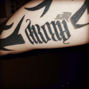 Inside arm bicep area of Tribal Sleeve its an Army Tribal Ambigram!