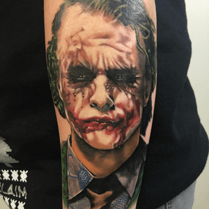 Once again I got inked. And I'm in love. On the 4th April 1979, an amazing human being was born. On 22nd January 2008, he left this world. Heath Ledger was and always will be my favourite actor and I wish I would of had the chance to meet him. In 2008, my favourite film of all time was released; The Dark Knight. Not only was it a great film, but it had Heath playing my favourite villain; The Joker. I instantly fell in love with his Joker, and it's only been in the last 4 years that I've been able to be comfortable expressing how much he did mean to me. Not only did his Joker help me through hard times, he helped me become who I am. Now this bit may sound a lil weird. But I feel like there's some weird ass connection that I have with him. He was born on April 4...same month as me (not say day...could have given birth to me earlier mum...)...he died on my mums 40th birthday (sorry mum I gave away your age...love you) and knowing this does make me feel closer to him. Now I could go on for days about how much he means to me and how his way of method acting was just amazing and insane at the same time... But hey-ho.. This piece was started yesterday...on Heath's birthday. It would have been finished but some lil complications came up... So here is my Heath Ledger as The Joker tattoo. This is part of my DC sleeve, the bottom half is nearly done. Thank you so much Ben Parry from Avon Tattoo. I can't believe how fucking awesome you are. Thank you momma for my early birthday present, once again you got me something Joker related and I can't thank you enough for it. I love you. And lastly, (late) Happy Birthday Heath. You're part of me forever now. Sleep tight.