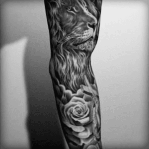 Looking to incoorporate the lion along with some flowers into a preexisting tattoo to creat a sleeve on my right arm.