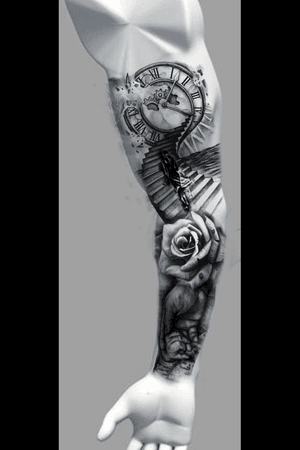 Love this inner arm tat. Im thinking red in rose. Maybe with yellow tint on tips. Keep the rest black and grey. Eliminate the fog around clock. Eliminate woman on stairs. Would love to have this. 