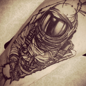 Astronaut tattoo by Junnio Nunes