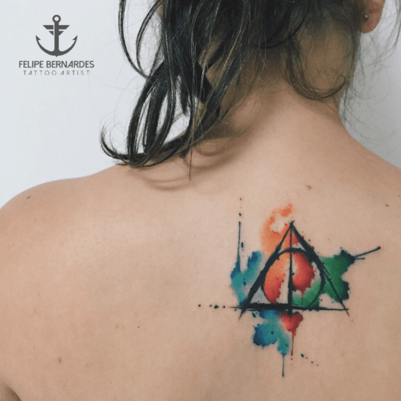 I didnt realise that watercolour style tattoos were a thing and I  stumbled across this rather lovely one  rharrypotter