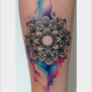 Loving this symetrical water color tattoo. I totally would want something similar 
