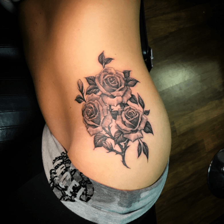 rose hip and thigh tattoos